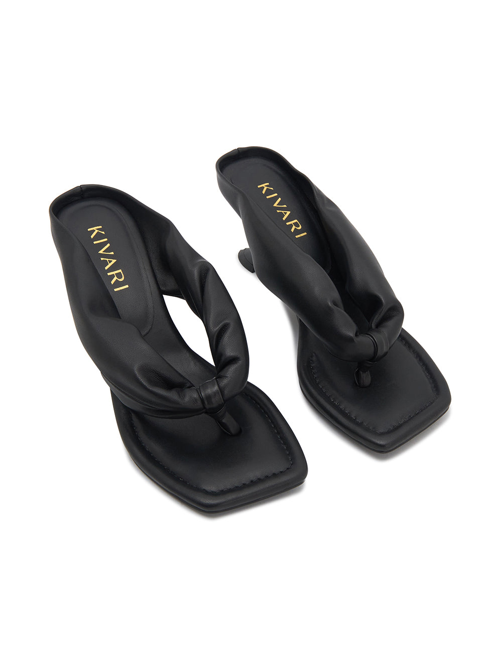 Black sandals with 'Kivari' branding on a white background